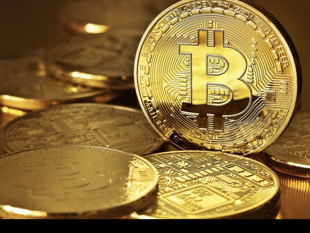 Futuro criptovalute, il mondo senza denaro contante tra rischi e vantaggi