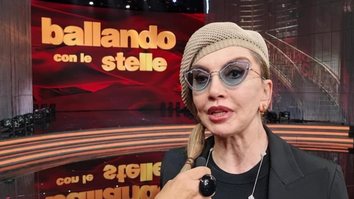 christian de sica commento foto milly carlucci
