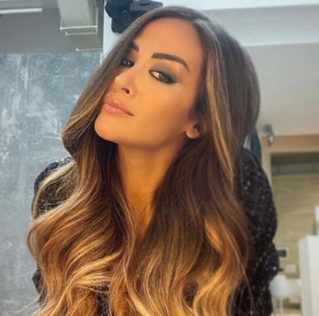 Giorgia Palmas sorridente durante un evento televisivo