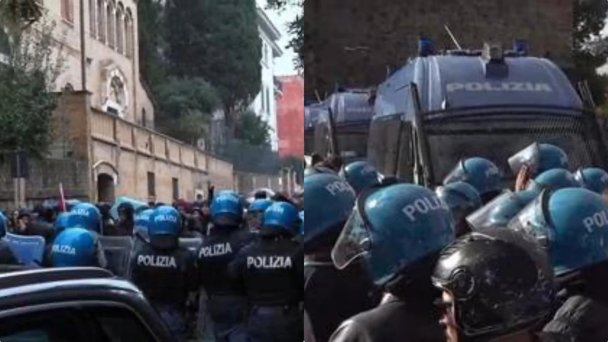 Agenti di polizia in assetto di sicurezza durante un corteo